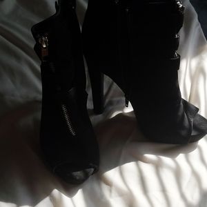 Black heeled open toed ankle boots